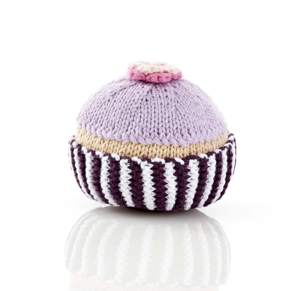 Lila Cupcake mit Zucker Blume / Rassel